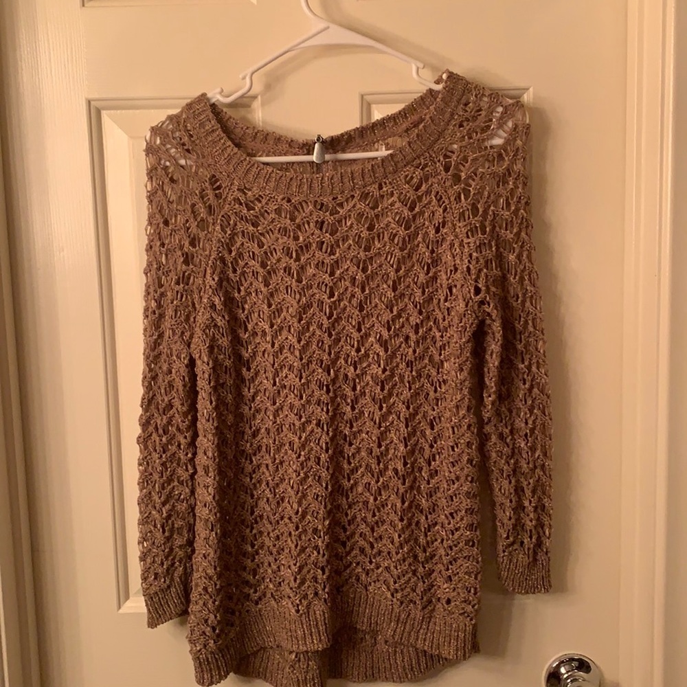 Brown Crochet  Modern looking Round neck Sweater. Very well fits sizes S-M.